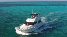 Take this awesome Carver 55 ft motor boat for a spin!