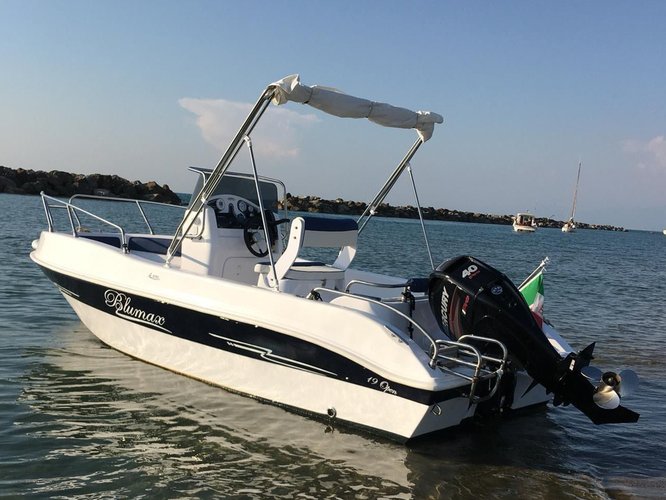 Enjoy luxury and comfort on this Livorno motor boat charter