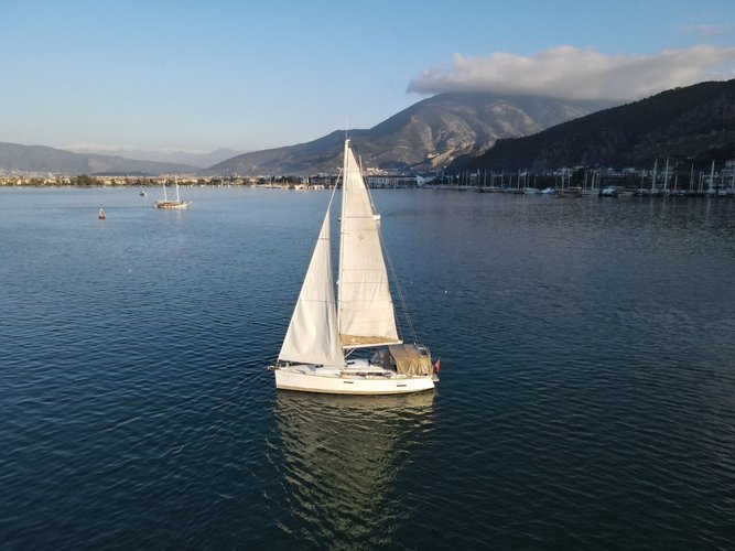 Sail the beautiful waters of Aegean on this cozy Jeanneau Sun Odyssey 379 - 2 cab.