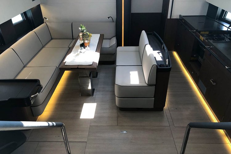 Up to 10 persons can enjoy a ride on this Beneteau boat