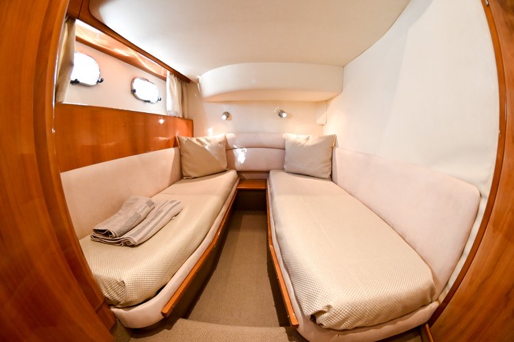 Up to 4 persons can enjoy a ride on this Motor yacht boat