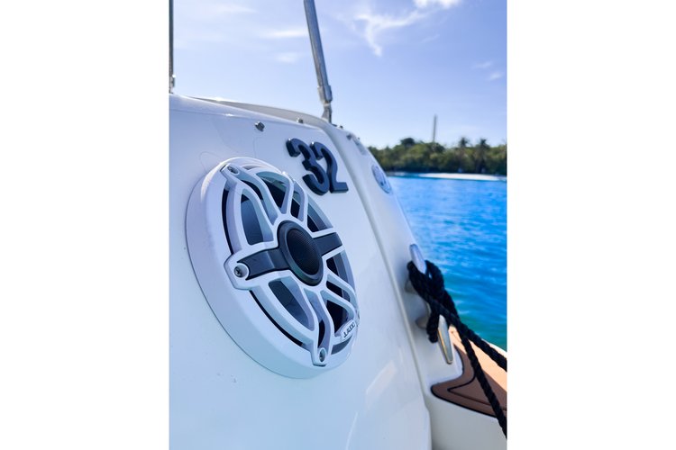 Up to 13 persons can enjoy a ride on this Deck boat boat