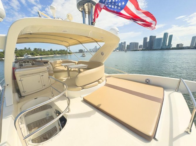 Discover Miami surroundings on this flybridge azimut boat