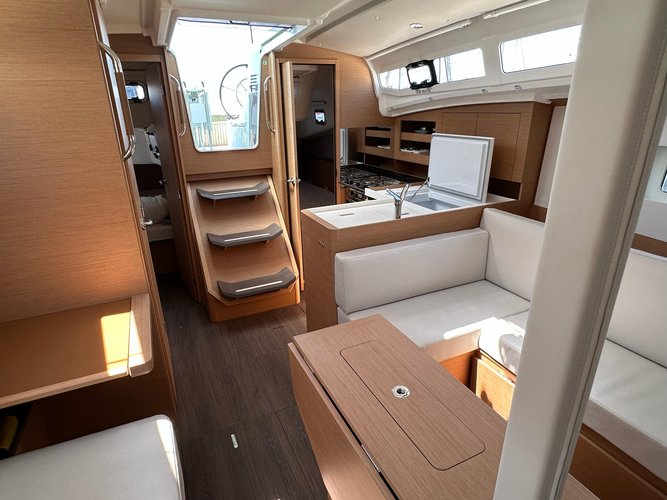 Up to 8 persons can enjoy a ride on this Jeanneau boat