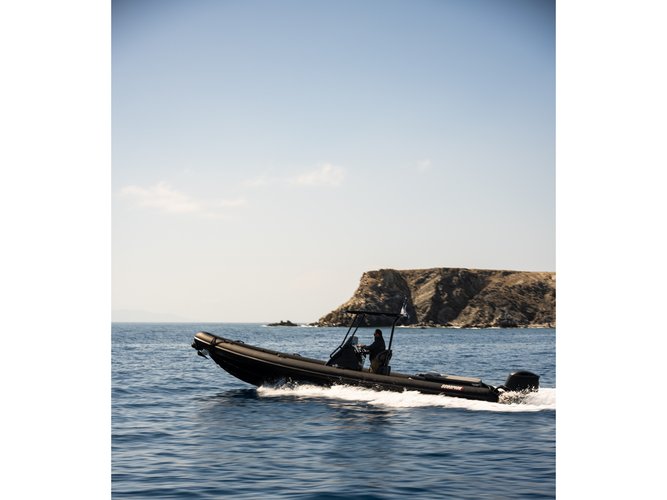Enjoy luxury and comfort on this Ornos motor boat charter
