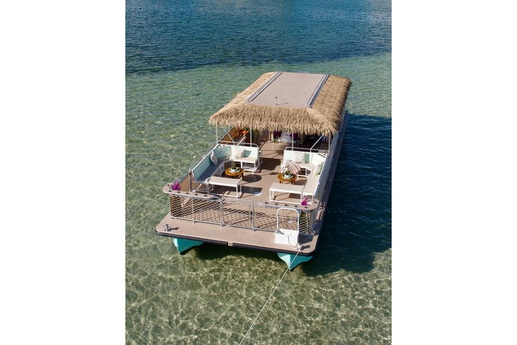 Miami's Premier 50ft Tiki Catamaran Party Boat Adventure: Spacious 45-Guest PartyBoat with Captain, Mate, and Relaxing Floats - Your Ideal Event on the Water!